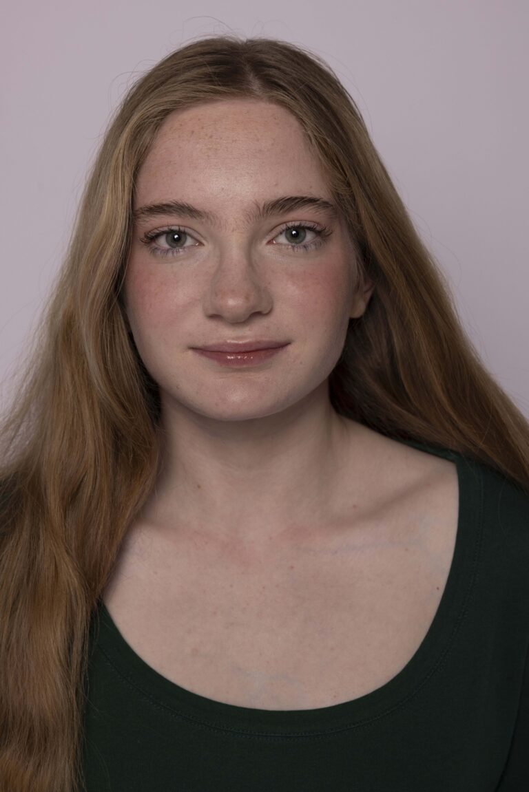 Emma Doucet Headshot 3 min 768x1151